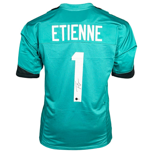 Travis Etienne Signed Jacksonville Teal Football Jersey (Beckett)