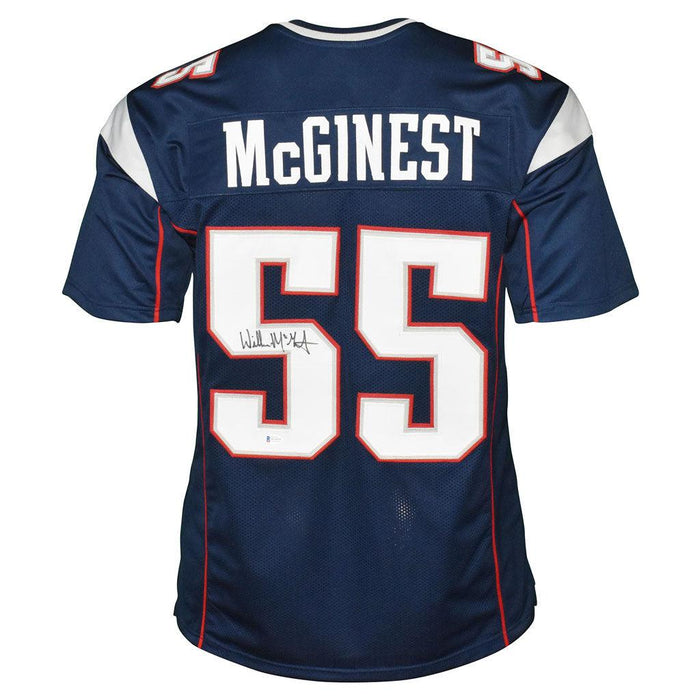 Willie McGinest framed autographed blue jersey