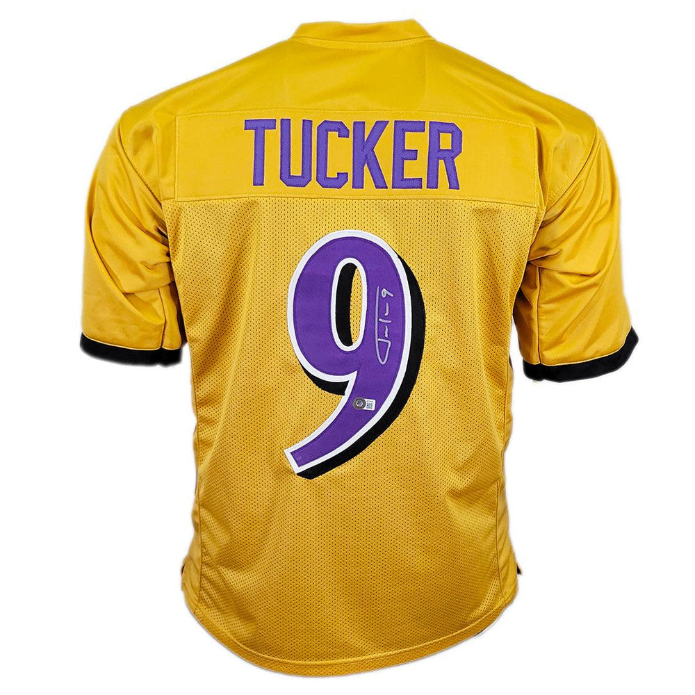 Justin Tucker Signed Baltimore Gold Football Jersey (Beckett) — RSA